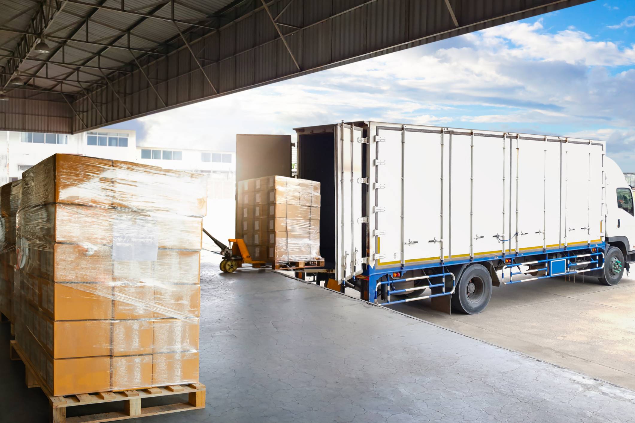 Truck being loaded with pallet boxes.